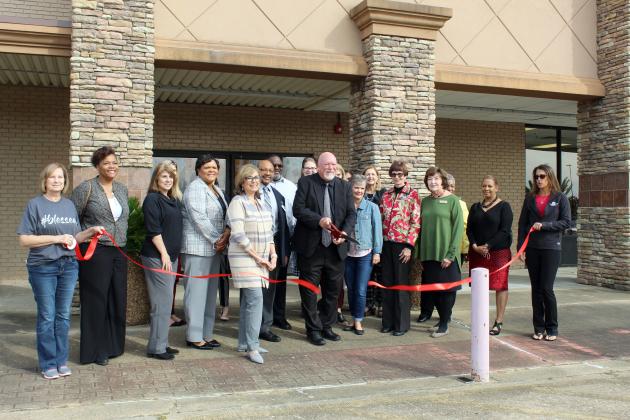 Dr. Danny Lovett, executive director of Region 5 Education Service Center, cuts the ribbon, celebrating the opening of the Silsbee Education and Career Center. The ribbon cutting was sponsored by the Silsbee Chamber of Commerce.