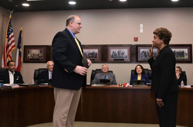 Port Director Chris Fisher administers the oath of office to incoming Port of Beaumont Board Commissioner for Ward 3 LaRue Smith. (Port of Beaumont photo)