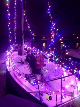 Sea Scouts participate in the Port Arthur Yacht Club Lighted Boat Parade.