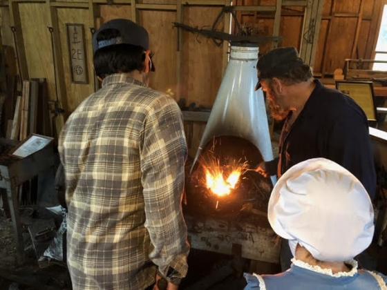 Sea Scouts learn blacksmithing.