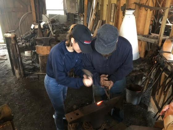 Sea Scouts learn blacksmithing.